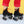 Chuffed Skates black roller skates  with yellow background