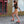 Smiling roller skater wearing Chuffed Skates peach pink roller skates
